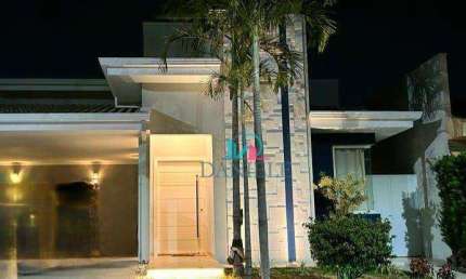 Casa térrea com 3 dormitórios suítes localizada no condomínio Acácias I.