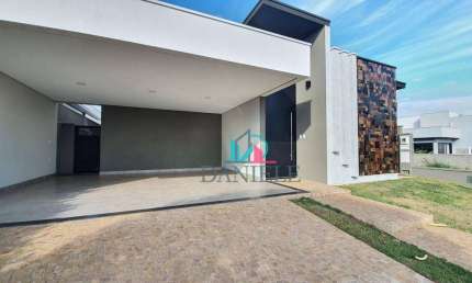 Casa térrea com 3 suítes localizada no condomínio Portal das Tipuanas.