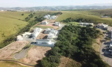 Terreno de 578 m² no cond. montserrat urbanova, quadra f - em aclive - fundos para área verde