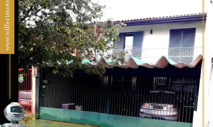 Casa com 3 quartos à venda na Rua Florisval Lançomi, 20, Tarumã, Curitiba, 94 m2 por R$ 640.000