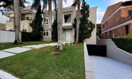 Casa com 4 dormitórios para alugar, 470m² por R$ 26.700/mês - Alphaville/SP