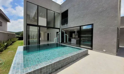 Casa com 4 dormitórios para alugar, 411m² por R$ 35.000/mês - Alphaville/SP