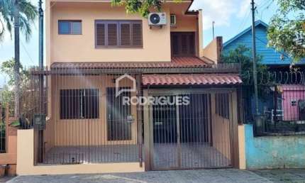 Casa com 4 quartos à venda na Rua Emílio Boeckel, 215, Fião, São Leopoldo por R$ 680.000