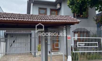 Casa com 3 quartos à venda na Rua Walter Hennemann, 286, Scharlau, São Leopoldo por R$ 690.000