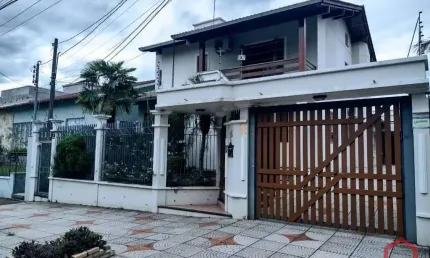 Casa em condomínio fechado com 3 quartos para alugar na Rua Anchieta, 205, Cristo Rei, São Leopoldo por R$ 5.000