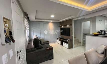 Casa em condomínio fechado com 3 quartos para alugar na Rua dos Guaramirins, 303, Igara, Canoas, 107 m2 por R$ 3.400