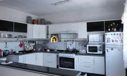 Sobrado residencial com salão comercial a venda na Vila Fiori