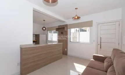 Casa em condomínio fechado com 2 quartos para alugar na Rua Tamoio, 3071, Niterói, Canoas, 102 m2 por R$ 3.000