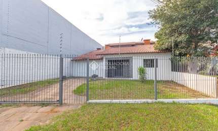 Casa em condomínio fechado com 3 quartos para alugar na Rua Pirapo, 941, Igara, Canoas, 230 m2 por R$ 4.400