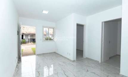 Casa em condomínio fechado com 2 quartos para alugar na Rua Brigadeiro Ivo Borges, 1000, São Luis, Canoas, 61 m2 por R$ 1.600