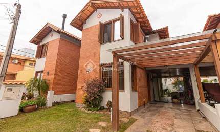 Casa em condomínio fechado com 3 quartos para alugar na Rua dos Jasmins, 120, Igara, Canoas, 117 m2 por R$ 4.000