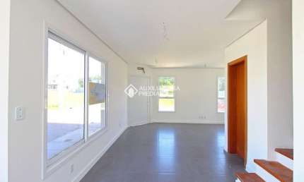 Casa em condomínio fechado com 3 quartos para alugar na Estrada Jorge Pereira Nunes, 478, Campo Novo, Porto Alegre, 128 m2 por R$ 3.500