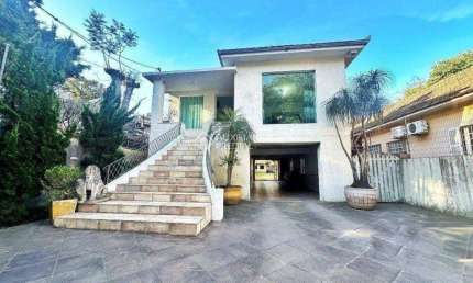 Casa comercial para alugar na Avenida Belém, 92, Teresópolis, Porto Alegre, 365 m2 por R$ 10.000