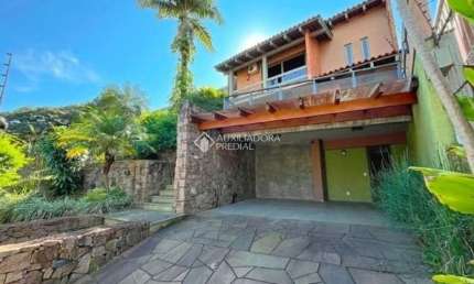 Casa com 3 quartos para alugar na Rua Edgar Luiz Schneider, 490, Jardim Isabel, Porto Alegre, 495 m2 por R$ 5.500