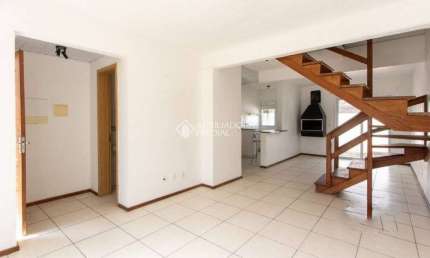 Casa em condomínio fechado com 3 quartos para alugar na Avenida Edgar Pires de Castro, 2520, Hípica, Porto Alegre, 85 m2 por R$ 2.000