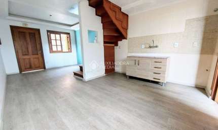 Casa em condomínio fechado com 2 quartos para alugar na Rua Professor Joaquim Louzada, 300, Camaquã, Porto Alegre, 83 m2 por R$ 1.900