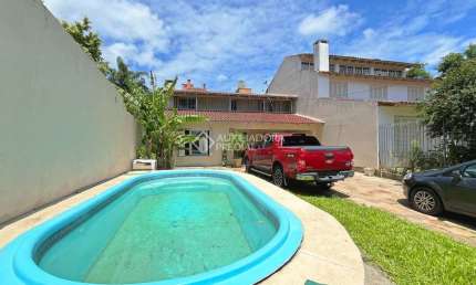Casa em condomínio fechado com 4 quartos para alugar na Rua João Palma da Silva, 70, Espírito Santo, Porto Alegre, 203 m2 por R$ 5.500