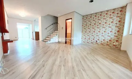 Casa em condomínio fechado com 3 quartos para alugar na Rua Angico, 114, Hípica, Porto Alegre, 204 m2 por R$ 5.000