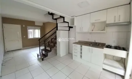 Casa em condomínio fechado com 3 quartos para alugar na Avenida Juca Batista, 473, Cavalhada, Porto Alegre, 98 m2 por R$ 2.512
