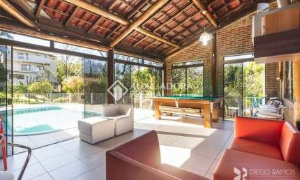 Casa em condomínio fechado com 5 quartos para alugar na Estrada das Três Meninas, 3421, Vila Nova, Porto Alegre, 320 m2 por R$ 10.000