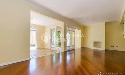 Casa em condomínio fechado com 4 quartos para alugar na Avenida Coronel Marcos, 483, Pedra Redonda, Porto Alegre, 197 m2 por R$ 4.300