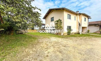 Casa com 4 quartos e amplo terreno de 1.059 m² no bairro Steffen