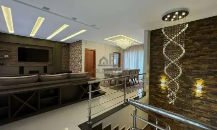 Casa com 3 quartos sendo uma suíte com closet e área de festas com piscina