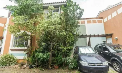Casa em condomínio fechado com 3 quartos para alugar na Rua Tenente Ary Tarrago, 1720, Jardim Itu Sabará, Porto Alegre por R$ 2.500