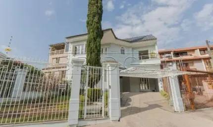 Casa em condomínio fechado com 3 quartos para alugar na Avenida Emílio Schlabitz Neto, 161, Alto Petrópolis, Porto Alegre por R$ 8.500
