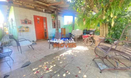 Pagina 1 Imóveis anuncia para venda casa com 3 dormitórios no Bairro Harmonia em Canoas/RS. - CA340