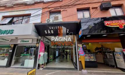 Página 1 Imóveis anuncia para aluguel excelente oportunidade de Sala no segundo andar na Galeria São Luiz no centro de Canoas/RS. - SA256