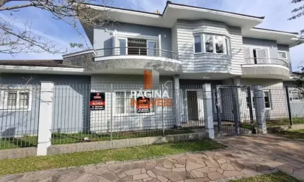 Excelente opção de casa para aluguel e venda com 03 dormitórios 01 suíte e vaga para 04 carros no bairro Moinhos de Vento em Canoas/RS - CA66