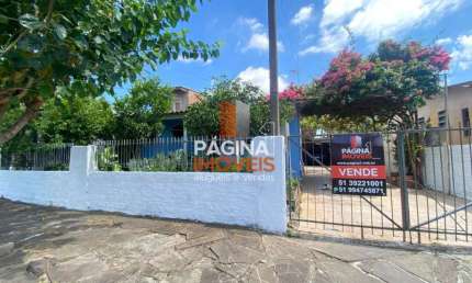 Página 1 Imóveis anuncia ótima oportunidade de casa para venda com 03 dormitórios, no Bairro Guajuviras em Canoas/RS. - CA360