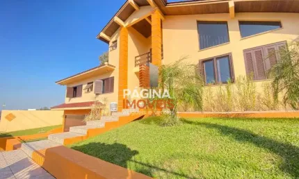 Página 1 Imóveis anuncia &amp;quot;lindo sobrado&amp;quot; com 3 dormitórios sendo 2  suítes, piscina, para Venda no Centro de Nova Santa Rita/RS. - CA553