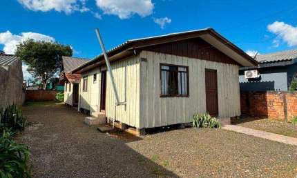 Terreno com 360m² contendo uma casa de madeira à venda, por R$ 250.000 - Primavera - Guarapuava/PR