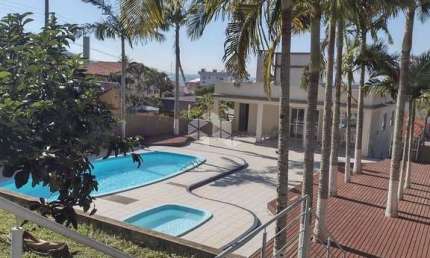 APARTAMENTO ESCRITURADO E MOBILIADO A VENDA NO BAIRRO INGLESES NO VALOR DE R$ 545.000,00