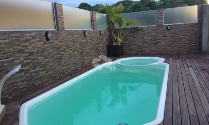 Casa geminada à venda no bairro Forquilhas - São José/SC