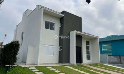 CASA COM 4 DORMITÓRIOS EM CONDOMINIO FECHADO À VENDA EM BERTIOGA/SP