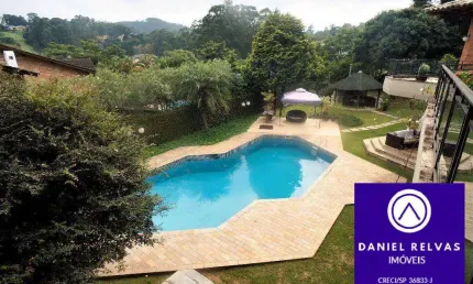 Casa com  Cinco Suítes  À Venda no Residencial Tamboré 1