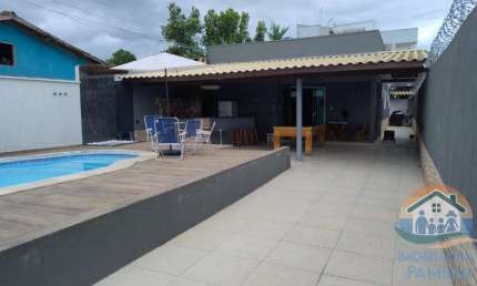 EXCELENTE IMÓVEL COM PISCINA E SEIS KITNETS INDEPENDENTES JÁ ALUGADAS LOCALIZADO NO BAIRRO BALNEÁRIO DOS GOLFINHOS!!