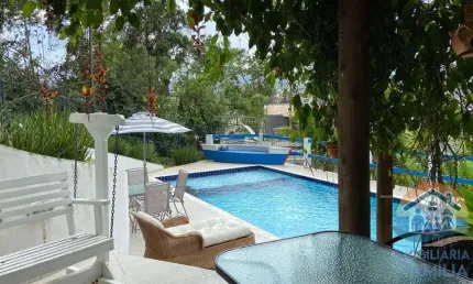 EXCELENTE SOBRADO COM PISCINA LOCALIZADO NO BAIRRO PRAINHA EM CARAGUATATUBA!