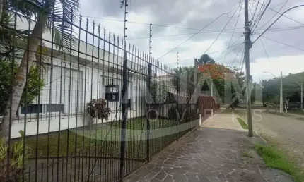 Casa com 4 quartos à venda na Guiana, 35, Jardim Lindóia, Porto Alegre por R$ 885.000