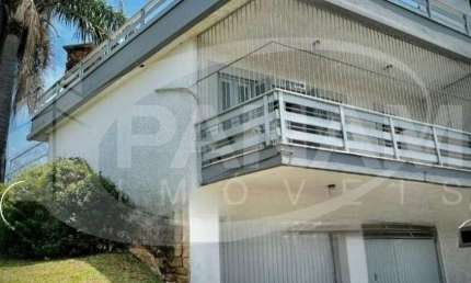 Casa com 4 quartos à venda na Avenida Benno Mentz, 897, Vila Ipiranga, Porto Alegre por R$ 1.100.000