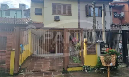 Casa com 3 quartos à venda na rua abdo jorge curi, 197, parque santa fé, porto alegre por r$ 429.500