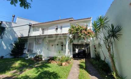 Casa com 3 quartos à venda na Rua Padre Henrique Lenz, 44, Jardim São Pedro, Porto Alegre por R$ 780.000