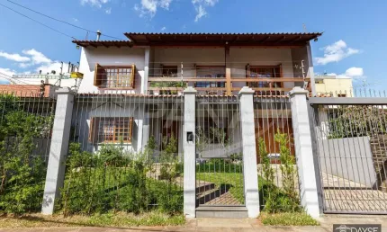 Casa com 3 quartos à venda na Rua Paulo Bento Lobato, 221, Jardim Lindóia, Porto Alegre por R$ 1.090.000