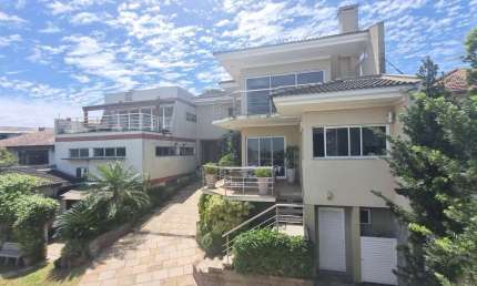 Casa com 2 quartos à venda na Rua Fernando Abbott, 1076, Cristo Redentor, Porto Alegre por R$ 2.650.000