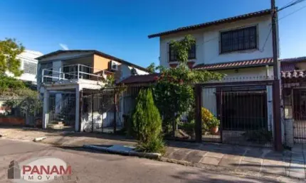 Casa com 3 quartos à venda na Rua Vicente Ferreira Gomes, 496, Sarandi, Porto Alegre por R$ 750.000