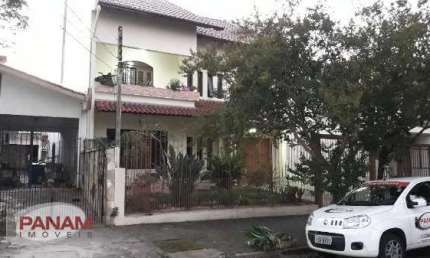 Casa com 4 quartos à venda na Rua Doutor José Éboli, 87, Jardim Itu Sabará, Porto Alegre por R$ 909.000