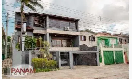 Casa com 5 quartos à venda na beco circular, 631, vila jardim, porto alegre por r$ 1.980.000